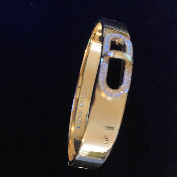 Michael Kors Gold-Tone Logo Plaque Bangle Bracelet in  Michael Kors Gold Tone Reduced Cityscape Bangle Bracelet